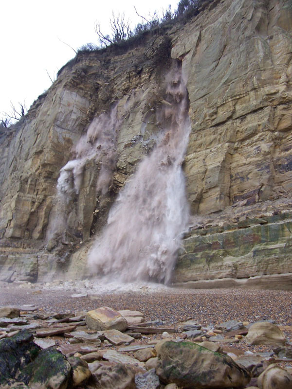 Rock fall at Pett Level - photographed by Dave Talbot as it happened!